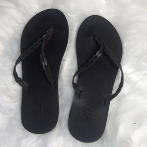Dark brown size 8 American eagle flip flops